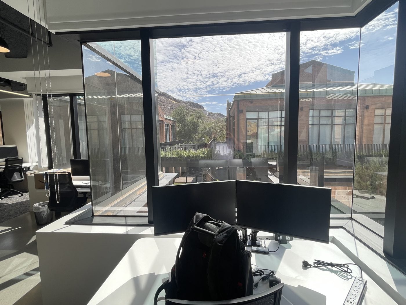 Corner workstation with a view at the Klutch MFM Tempe office